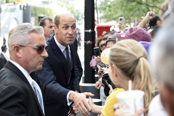 William, Prince of Wales, greets fans as he visits a FDNY Firehouse on Tuesday, Sept. 19, 2023, in New York City. (Dimitrios Kambouris/Pool Photo via AP)