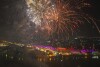 Fireworks light the sky as lamps are light up the banks of the river Saryu on the eve of the Hindu festival of Diwali, in Ayodhya, India, Saturday, Nov. 11, 2023. Ayodhya city in the northern Indian state of Uttar Pradesh Saturday set a record by lighting over 2.2 million earthen oil lamps during Deepotsav celebrations on the eve of Diwali, creating a new Guinness World Record for lighting lamps in such a large number, according to state tourism department. (AP Photo/Rajesh Kumar Singh)