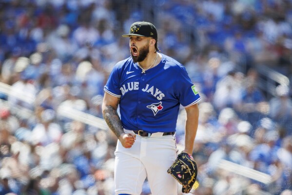 Toronto Blue Jays pitcher Alek Manoah reacts after the final out of the top of the sixth inning of a baseball game against the Tampa Bay Rays in Toronto, Sunday, May 19, 2024. (Cole Burston/The Canadian Press via AP)