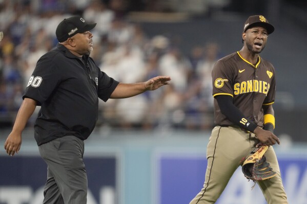 Tossed balls from stands, apparently aimed at Profar, interrupt Padres' win  in NLDS Game 2 | AP News