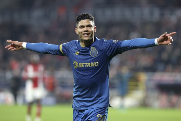 Porto's Evanilson celebrates after scoring his side's fourth goal, his third of the match, during the Champions League Group H soccer match between Royal Antwerp and FC Porto at the Bosuil Stadium, Antwerp, Belgium, Wednesday, Oct. 25, 2023. (AP Photo/Francois Walschaerts)