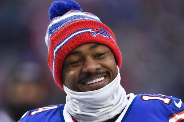 FILE - Buffalo Bills wide receiver Stefon Diggs walks off the field after the first half of an NFL football game against the Atlanta Falcons in Orchard Park, N.Y., Sunday, Jan. 2, 2022. Buffalo Bills receiver Stefon Diggs agreed to a four-year, $96 million contract extension, a person with direct knowledge of the deal told The Associated Press on Wednesday, April 6, 2022.(AP Photo/Adrian Kraus, File)