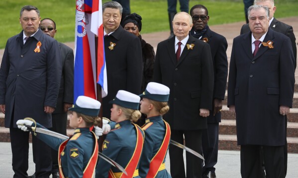 From left: Kyrgyz President Sadyr Japarov, Chinese President Xi Jinping, Russian President Vladimir Putin and Tajik President Emomali Rahmon attend a wreath laying ceremony at the Tomb of the Unknown Soldier in Alexander Garden after the Victory Day military parade in Moscow, Russia, Friday, May 9, 2025, during celebrations of the 80th anniversary of the Soviet Union's victory over Nazi Germany during the World War II. (Yuri Kochetkov/Pool Photo via AP)