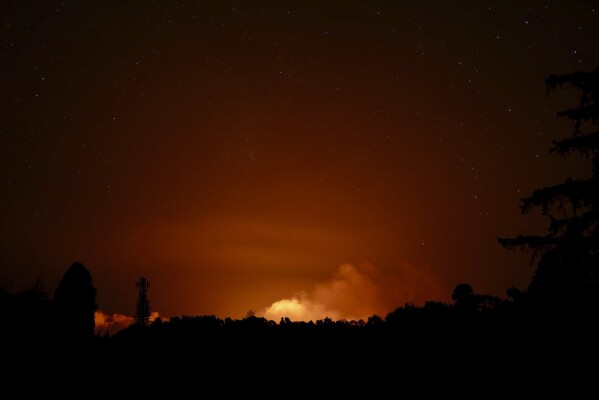 This image provided by the U.S. Geological Survey, seen from the Volcano Golf Course, shows a plume from the Kilauea volcano in Hawaii in the early morning hours on Monday, June 3, 2024. Kilauea, one of the most active volcanoes in the world, began erupting early Monday in an area that last erupted a half-century ago, the U.S. Geological Survey's Hawaiian Volcano Observatory said. (D.A. Phillips/U.S. Geological Survey via AP)