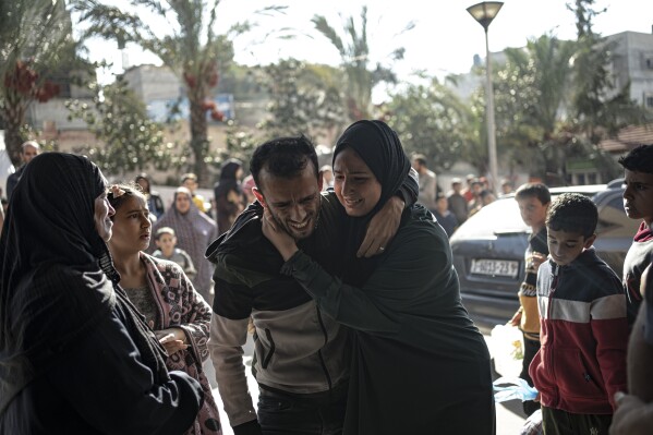 Palestinians wounded in the ongoing Israeli bombardment of the Gaza Strip arrive to a hospital in Khan Younis on Friday, Nov. 17, 2023. (AP Photo/Fatima Shbair)