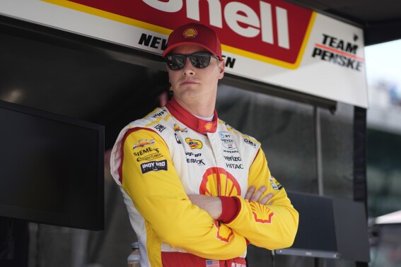 Josef Newgarden waits in his pit box during a practice session for the Indianapolis 500 auto race at Indianapolis Motor Speedway, Monday, May 20, 2024, in Indianapolis. (AP Photo/Darron Cummings)