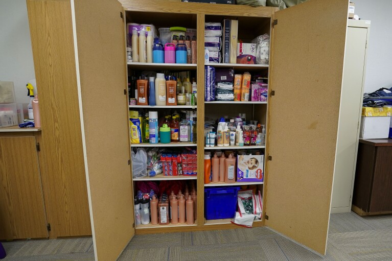 Food pantry and essentials at Frye Elementary School in Chandler, Arizona, Tuesday, May 23, 2023. (AP Photo/Darryl Webb)