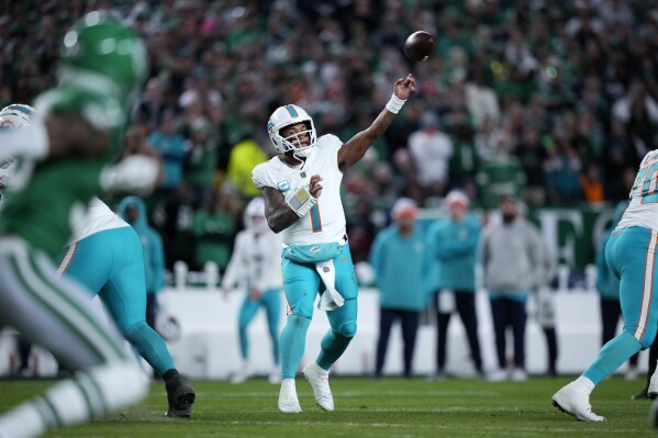 Miami Dolphins quarterback Tua Tagovailoa (1) throws a pass during the first half of an NFL football game against the Philadelphia Eagles on Sunday, Oct. 22, 2023, in Philadelphia. (AP Photo/Matt Slocum)