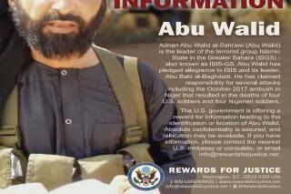 This undated image provided by Rewards For Justice shows a wanted posted of Adnan Abu Walid al-Sahrawi, the leader of Islamic State in the Greater Sahara. French President Emmanuel Macron announced the death of al-Sahrawi Wednesday, Sept. 15, 2021, calling the killing “a major success” for the French military after more than eight years fighting extremists in the Sahel. Macron tweeted that al-Sahrawi “was neutralized by French forces” but gave no further details.  (Rewards For Justice via AP)