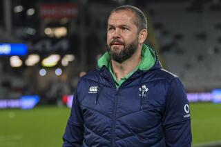 Ireland head coach Andy Farrell watches his players warm-up ahead of the rugby international between the All Blacks and Ireland at Eden Park in Auckland, New Zealand, Saturday, July 2, 2022. (Andrew Cornaga/Photosport via AP)