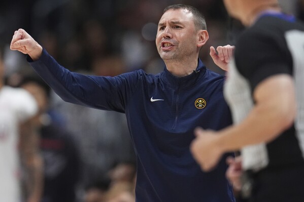 Denver Nuggets interim head coach David Adelman directs his team against the Oklahoma City Thunder in the second half of Game 6 in the Western Conference semifinals of the NBA basketball playoffs Thursday, May 15, 2025, in Denver. (AP Photo/David Zalubowski)