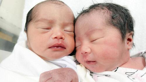 Newborn twins lie next to each other in a hospital in Tamuning, Guam on May 27, 2023. Many, including newborns, remain without electricity as Guam recovers from Typhoon Mawar (Thomas Shieh via AP)