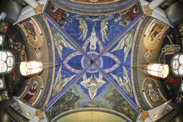 A mural by Croatian-American artist Maxo Vanka titled "Transcendent Vision (including Disciples)" is seen in St. Nicholas Croatian Catholic Church after undergoing preservation efforts in Millvale, Pa., Wednesday, May 28, 2025. (AP Photo/Gene J. Puskar)