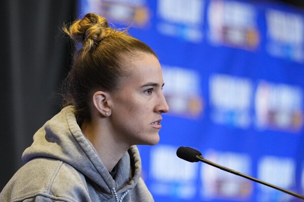 New York Liberty guard Sabrina Ionesco answers a question during media day the the NBA All-Star basketball game in Indianapolis, Saturday, Feb. 17, 2024. (AP Photo/Michael Conroy)