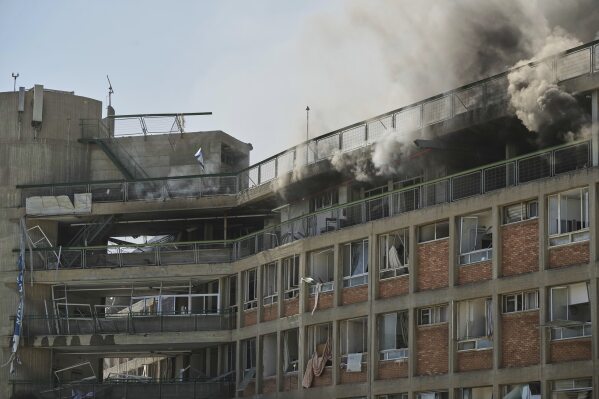 Smokes rises from a building of the Soroka hospital complex after it was hit by a missile fired from Iran in Beersheba, Israel, Thursday, June 19, 2025. (AP Photo/Leo Correa)