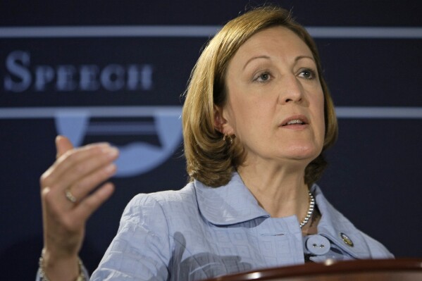 FILE - Then-Ohio Secretary of State Jennifer Brunner answers a question during a debate at the City Club of Cleveland, April 13, 2010, in Cleveland. On Tuesday, Nov. 7, 2023, Brunner, now an Ohio Supreme Court justice, filed suit against two state officials over a recently passed law that requires certain judicial candidates to declare their party affiliation on ballots. (AP Photo/Tony Dejak, File)