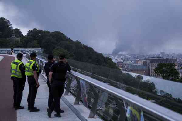 Smoke rises after Russian drone strike in Kiev, Ukraine on Tuesday, June 10th, 2025 (AP Photo/evgeniy maloletka)