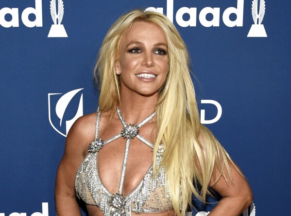 Britney Spears recently flashed herself again at a football game