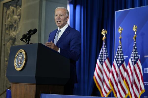 President Joe Biden speaks at the White House Conservation in Action Summit at the Department of the Interior, Tuesday, March 21, 2023, in Washington. (AP Photo/Evan Vucci)