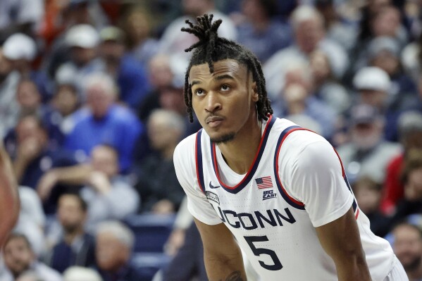UConn guard Stephon Castle looks on during the second half of an NCAA college basketball game, Monday, Nov. 6, 2023, in Storrs, Conn. (AP Photo/Mary Schwalm)