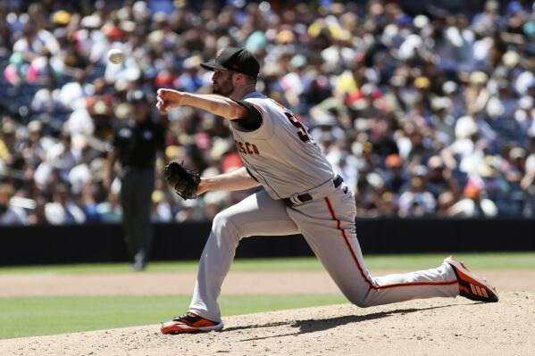 San Francisco Giants starting pitcher Alex Wood works against the San Diego Padres in the fifth inning of a baseball game, Sunday, July 10, 2022, in San Diego. (AP Photo/Derrick Tuskan)