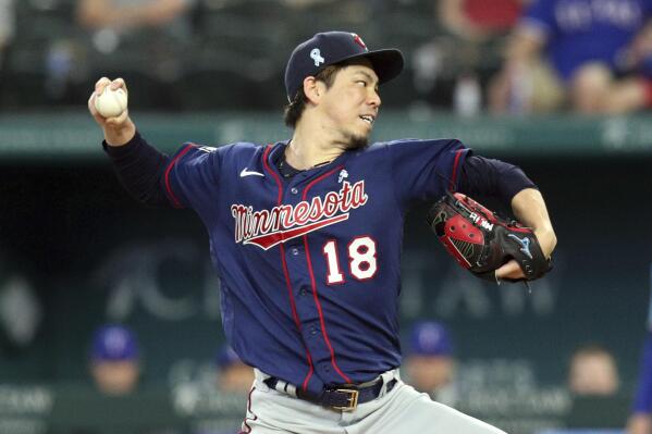 Minnesota Twins starting pitcher Kenta Maeda (18) delivers in the third inning against the Texas Rangers at a baseball game Sunday, June 20, 2021, in Arlington, Texas. (AP Photo/Richard W. Rodriguez)
