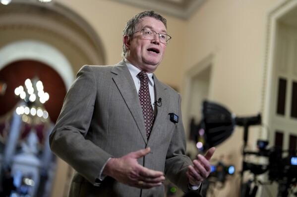 FILE - Rep. Thomas Massie, R-Ky., speaks during a TV news interview at the Capitol in Washington, Friday, Jan. 12, 2024. Fresh off his role in a failed attempt to topple the House speaker, Republican Rep. Massie downplayed any political fallout back home in Kentucky as he looked to maintain his dominance in his solidly conservative district as Bluegrass State voters headed to the polls Tuesday, May 21, 2024. (AP Photo/J. Scott Applewhite, File)