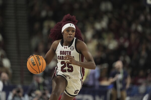 South Carolina guard Raven Johnson brings the ball down court against LSU during the second half of an NCAA college basketball game at the Southeastern Conference women's tournament final Sunday, March 10, 2024, in Greenville, S.C. (AP Photo/Chris Carlson)