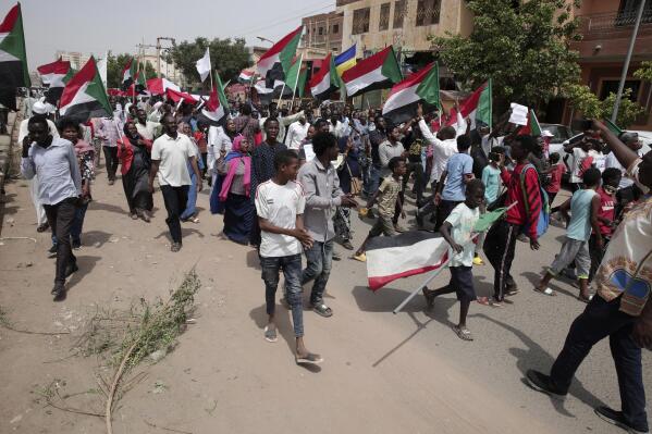 Hundreds of Sudanese rallied against last year's military coup during a demonstration on the streets of Khartoum, Sudan, Tuesday, July 26, 2022. (AP Photo/Marwan Ali)