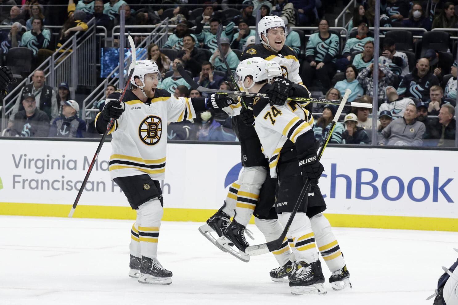 Jake DeBrusk scores two late goals as Bruins edge Penguins in Winter Classic