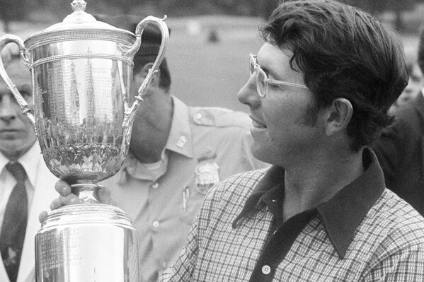 Hale Irwin is shown with his trophy after winning the U.S. Open Championship title at the Winged Foot Golf Club in Mamaroneck, N.Y., June 16, 1974. This is the 50-year anniversary of Irwin winning the famous "Massacre at Winged Foot." (AP Photo, file)