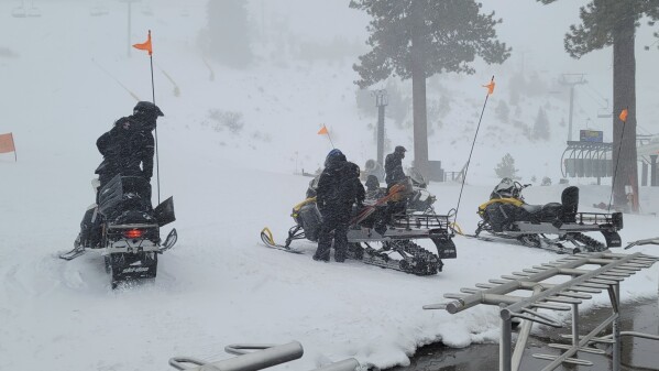 FILE -Rescue crews work at the scene of an avalanche at the Palisades Tahoe ski resort on Wednesday, Jan. 10, 2024, near Lake Tahoe, Calif. As a massive winter storm dumped snow across much of the western U.S., winter sport enthusiasts headed to ski resorts and backcountry slopes ahead of the long Martin Luther King Jr. Day weekend. But in many areas, the storm brought a high risk of avalanche conditions. (Mark Sponsler via AP, File)
