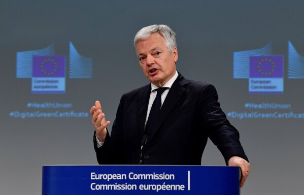 European Commissioner for Justice Didier Reynders speaks during a media conference on the Commissions response to COVID-19 at EU headquarters in Brussels, Wednesday, March 17, 2021. The European Commission is proposing Wednesday to create a Digital Green Certificate to facilitate safe free movement inside the EU during the COVID-19 pandemic. (John Thys, Pool via AP)