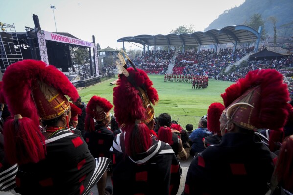 Indigenous Nagas dance and showcase their tradition during the Hornbill Festival in Kisama, on the outskirts of Kohima, capital of the northeastern Indian state of Nagaland, Tuesday, Dec. 10, 2024. (AP Photo/Anupam Nath)
