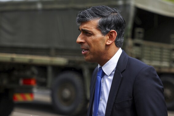 Britain's Prime Minister Rishi Sunak speaks as he takes part in broadcasting a clip during his visit to the Helles Barracks at the Catterick Garrison, a military base in North Yorkshire, Britain, Friday, May 3, 2024. (Molly Darlington/Pool photo via AP)