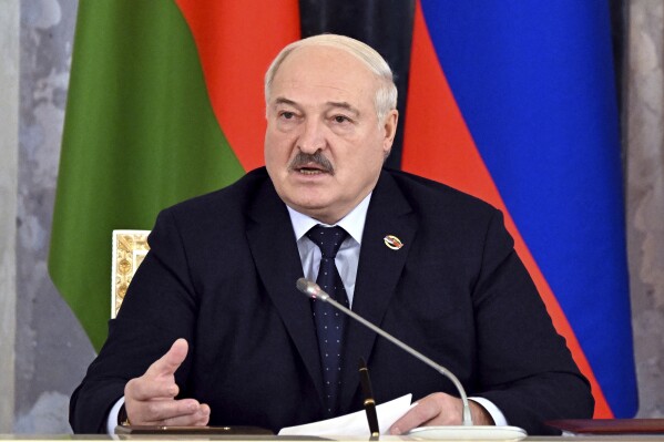 FILE - Belarus President Alexander Lukashenko speaks during a meeting of the Union State Supreme Council with Russian President Vladimir Putin in St. Petersburg, Russia, Monday, Jan. 29, 2024. A bill in Belarus that would outlaw the promotion of homosexuality and other behavior is set to land on lawmakers' desks amid an unwavering crackdown on dissent initiated by authoritarian President Alexander Lukashenko in 2020. (Pavel Bednyakov, Sputnik, Kremlin Pool Photo via AP, File)