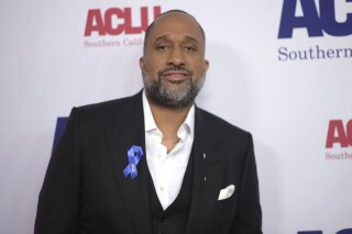 FILE - Kenya Barris, series creator of “black-ish,” arrives at the ACLU SoCal's Bill of Rights Dinner on Nov. 11, 2018, in Beverly Hills, Calif. A politically charged episode of “black-ish” from 2017 that was shelved by ABC has found a home on the streaming service Hulu. (Photo by Richard Shotwell/Invision/AP, File)