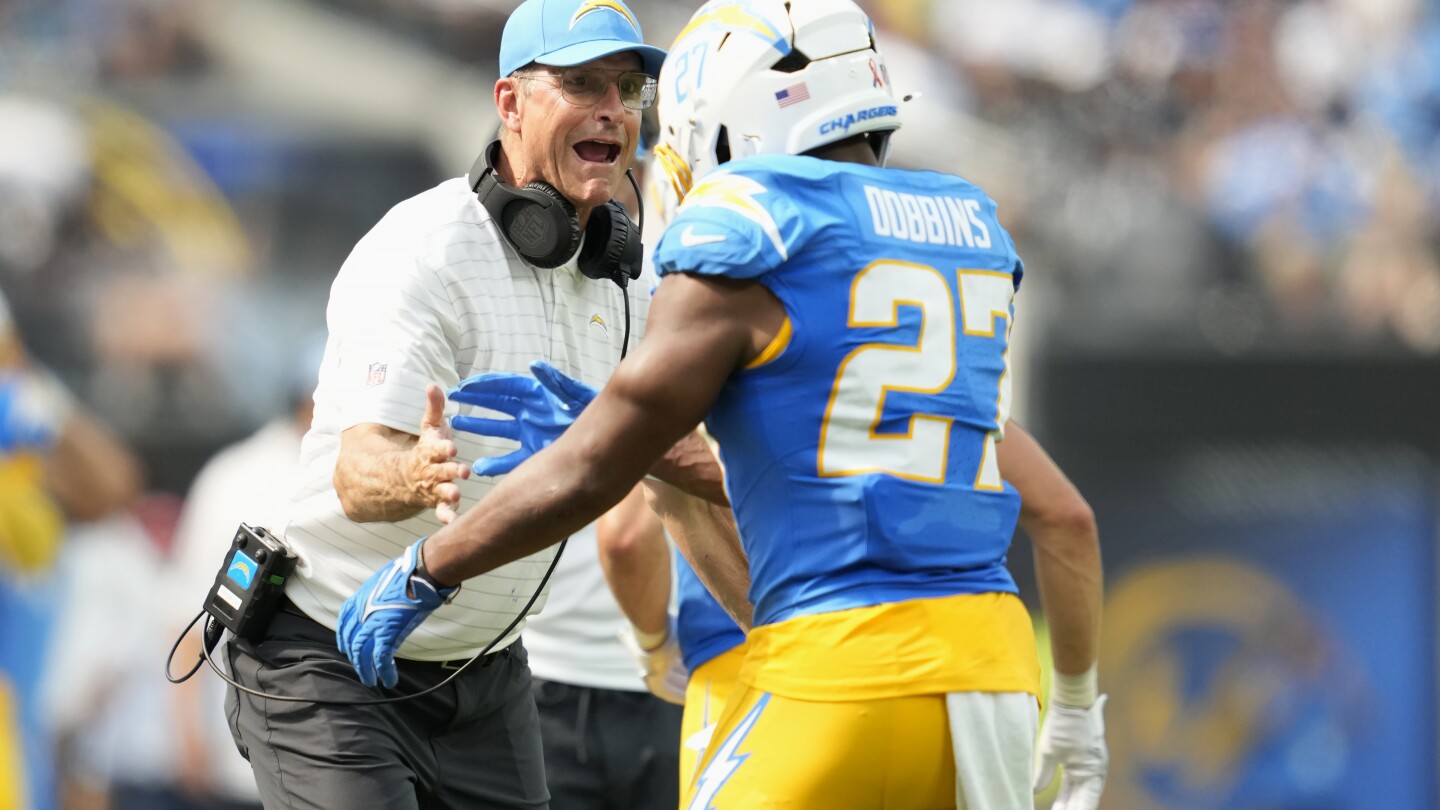 JK Dobbins runs for 135 yards as Chargers beat Raiders 22-10 in Jim Harbaugh’s debut