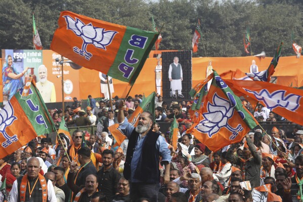 Supporters of Bharatiya Janata party shout slogans during Delhi state election campaign rally in New Delhi, India, Friday, Jan. 31, 2025. (AP Photo)