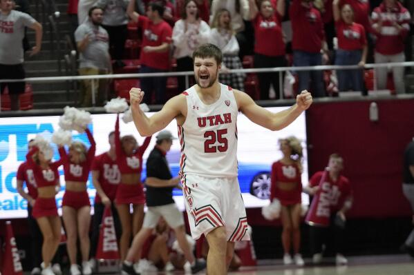 Utah guard Rollie Worster (25) reacts after his team scored against Arizona during the second half of an NCAA college basketball game Thursday, Dec. 1, 2022, in Salt Lake City. (AP Photo/Rick Bowmer)