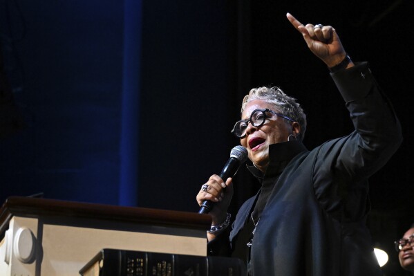 Rev. Gina Stewart preaches during church service at Rankin Chapel, Sunday, April 7, 2024, in Washington. Throughout its long history, the Black Church in America has, for the most part, been a patriarchal institution. Now, more Black women are taking on high-profile leadership roles. But the founder of Women of Color in Ministry estimates that less than one in 10 Black Protestant congregations are led by a woman. “I would hope that we can knock down some of those barriers so that their journey would be just a little bit easier,” said Stewart. (AP Photo/Terrance Williams)