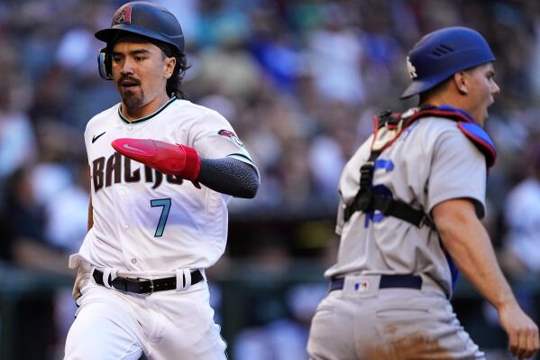 Los Angeles Dodgers catcher Will Smith throws to second base during a