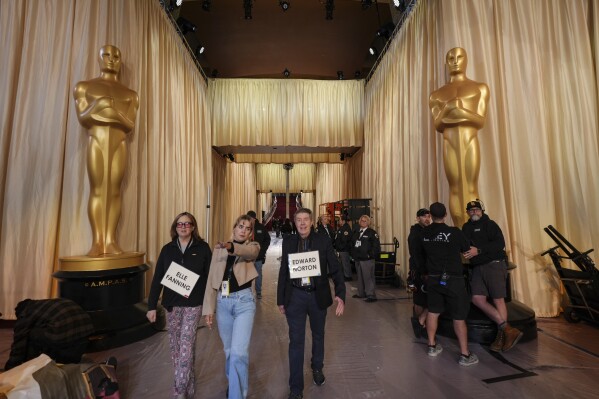 Oscar presenters Emma Stone, Andrew Garfield, Whoopi Goldberg rehearse  before the show | AP News