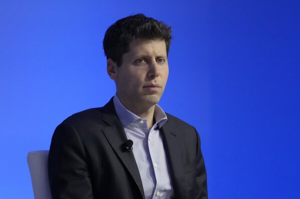 FILE - OpenAI CEO Sam Altman participates in a discussion during the Asia-Pacific Economic Cooperation (APEC) CEO Summit, Nov. 16, 2023, in San Francisco. Altman, the ousted leader of ChatGPT-maker OpenAI, is returning to the company that fired him late last week, the latest in a saga that has shocked the artificial intelligence industry. San Francisco-based OpenAI said in a statement late Tuesday, Nov. 21: “We have reached an agreement in principle for Sam Altman to return to OpenAI as CEO with a new initial board of Bret Taylor (Chair), Larry Summers, and Adam D’Angelo.” (AP Photo/Eric Risberg, File)