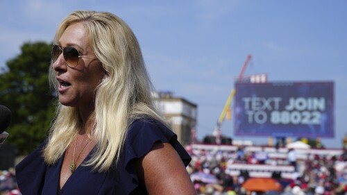 Rep. Marjorie Taylor Greene, R-Ga., speaks to reporters ahead of a campaign rally by former President Donald Trump on Saturday, July 1, 2023, in Pickens, S.C.&nbsp;Social media users are sharing a tweet about the Titan submersible from a parody account falsely claiming that it's a real statement from Greene.&nbsp;(AP Photo/Meg Kinnard)