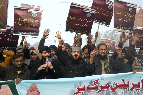 Supporters of a religious group 'Markazi Jamiyat Ahle Hadith Pakistan' hold a demonstration to condemn Iran strike in the Pakistani border area, in Lahore, Pakistan, Friday, Jan. 19, 2024. The unprecedented attacks by both Pakistan and Iran on either side of their border appeared to target Baluch militant groups with similar separatist goals. The countries accuse each other of providing a haven to the groups in their respective territories. (AP Photo/K.M. Chaudary)