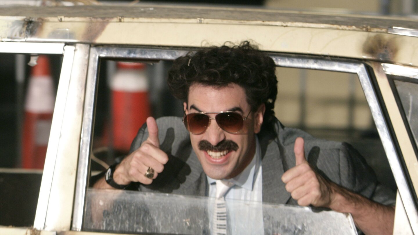 Review: Borat is back, and this time he fits right in | AP News