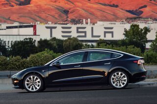 
              This undated image provided by Tesla Motors shows the Tesla Model 3 sedan. The electric car company’s newest vehicle, the Model 3, which set to go to its first 30 customers Friday, July 28, 2017, is half the cost of previous models. Its $35,000 starting price and 215-mile range could bring hundreds of thousands of customers into Tesla’s fold, taking it from a niche luxury brand to the mainstream. (Courtesy of Tesla Motors via AP)
            