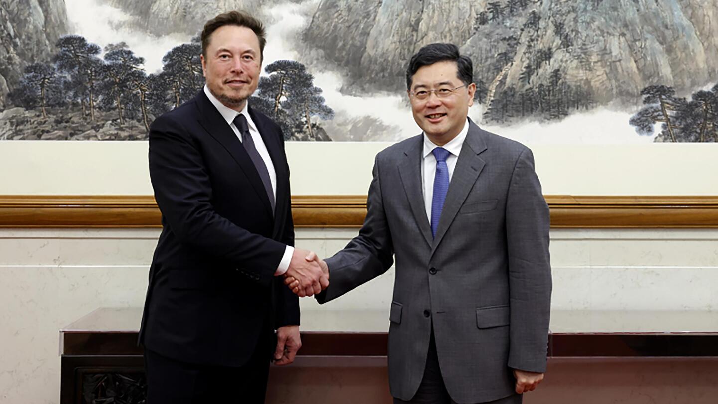 Tesla's Musk meets Chinese foreign minister, who calls for 'mutual respect' in US-China relations | AP News
