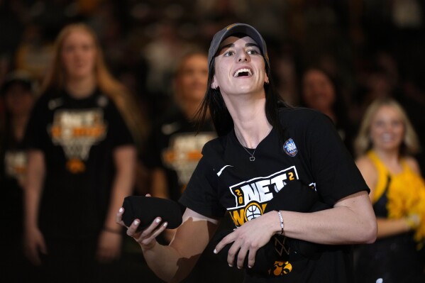 Iowa guard Caitlin Clark reacts to fans during an Iowa women's basketball team celebration, Wednesday, April 10, 2024, in Iowa City, Iowa. Iowa lost to South Carolina in the Final Four college basketball championship game of the women's NCAA Tournament on Sunday. (AP Photo/Charlie Neibergall)